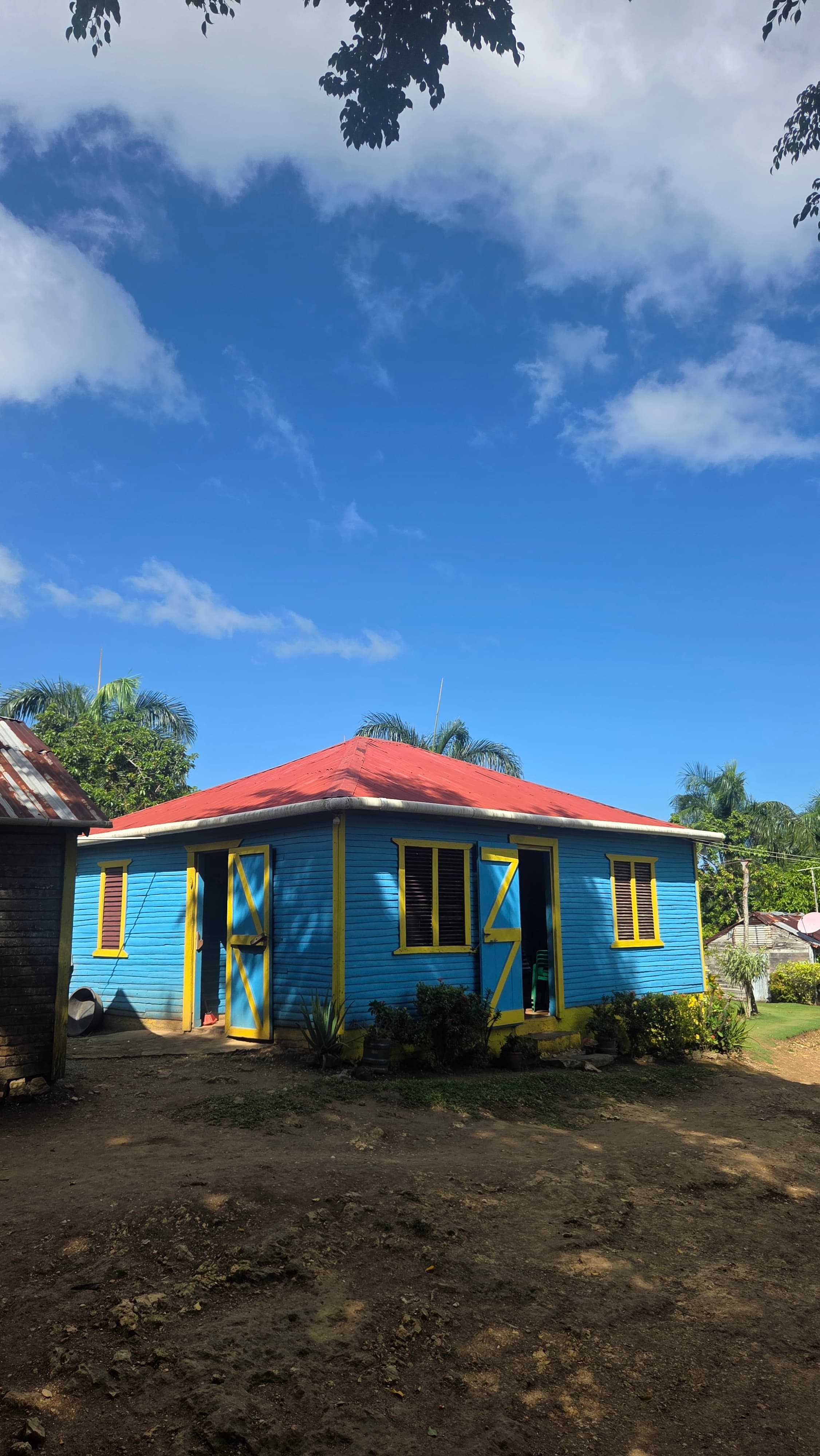 Colorful countryside house with coffee and cacao roasting