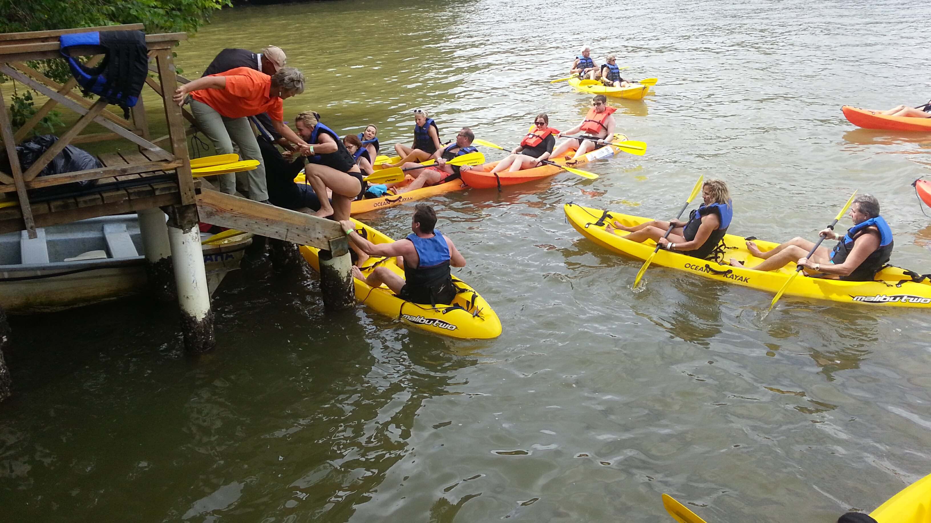 Guests boarding yellow kayaks in Los Haitises